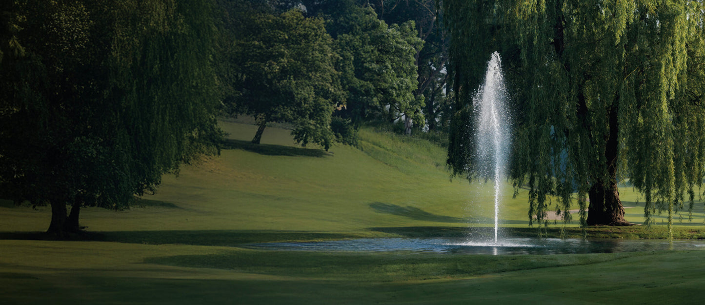 Kasco J Series decorative fountain operating in a pond