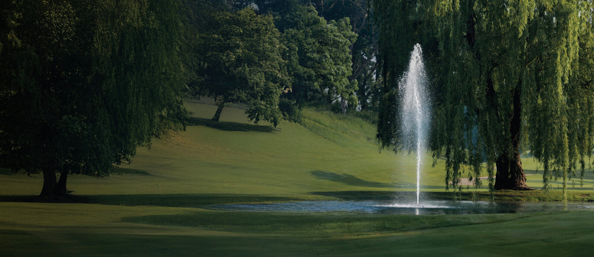 Kasco J Series decorative fountain operating in a pond