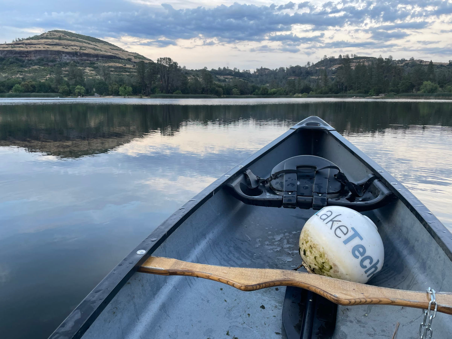 LakeTech buoy transported by canoe for lake monitoring deployment