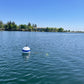 LakeTech monitoring buoy deployed in blue lake water